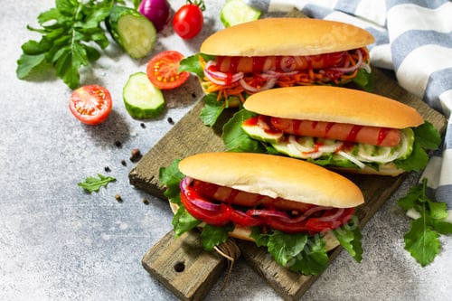 Preview: Hot dog with barbecue grilled sausage and fresh vegetables