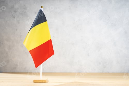 Preview: Belgium table flag on white textured wall