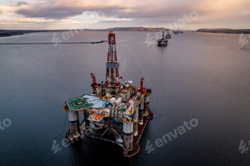 Preview: Oil and Gas Drilling Platform at Sea at Sunset