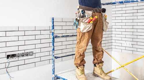Preview: Electrician Builder at work, installation of lamps at height.