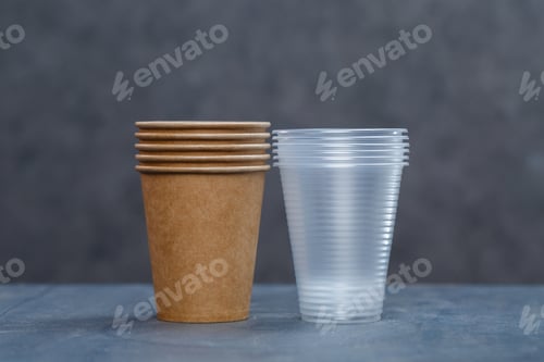 Preview: Eco-friendly disposable tableware made of bamboo wood and paper on a gray background. Plastic