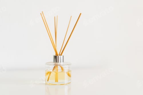 Preview: Aromatherapy. Diffuser bottle on a white background. Incense sticks for the home
