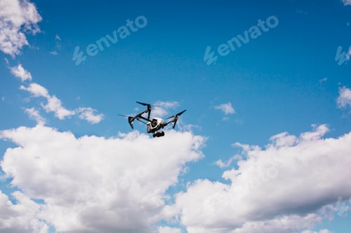 Preview: Low angle view of drone flying