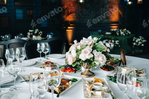 Preview: wedding table decoration with flowers on the table in the castle, table decor for dinner by