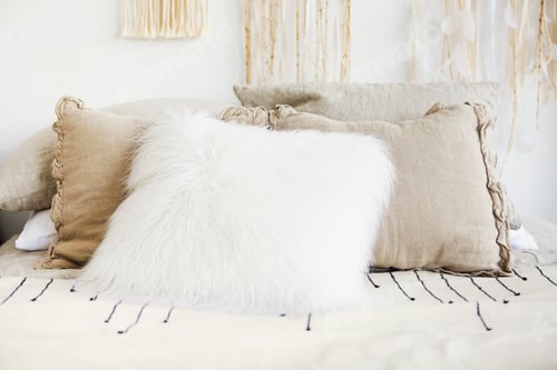 Preview: Interior of bedroom with bed in boho style decor macrame