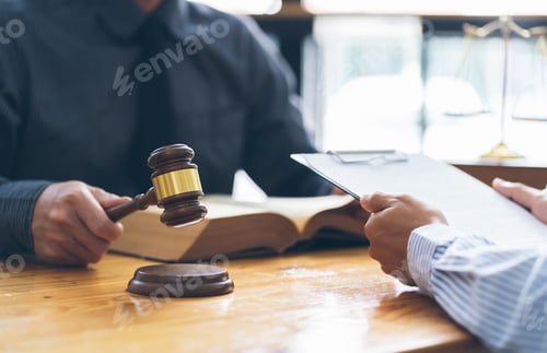 Preview: Male lawyer or judge consult having team meeting with Businessman client, Law and Legal services con
