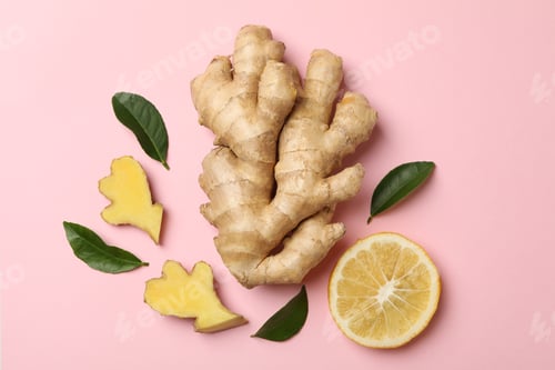 Preview: Fresh ginger, leaves and lemon on pink background