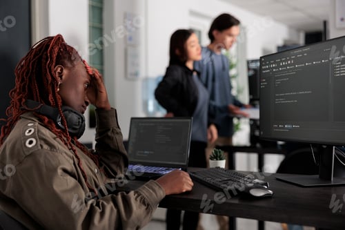 Preview: Pensive system engineer thinking at programming ideas trying to write html code