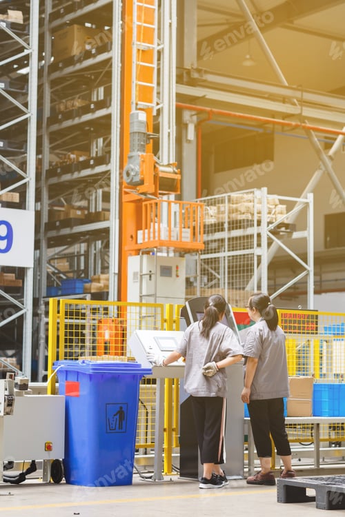 Preview: Two employees working on big warehouse