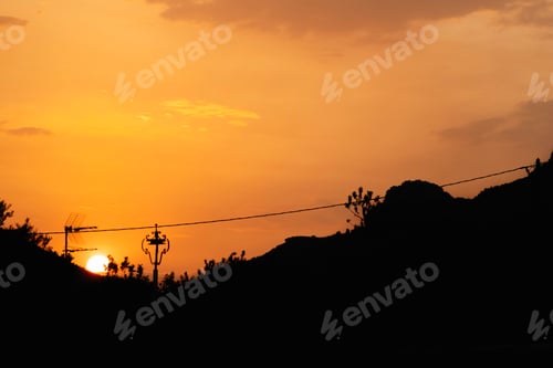 Preview: Sunset with shapes of mountains in shadow