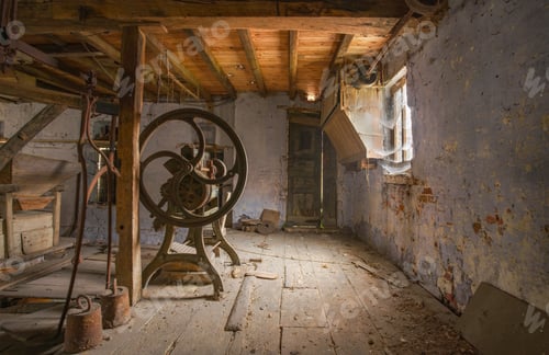 Preview: Interior of an old abandoned manufacturing building with rusty machinery