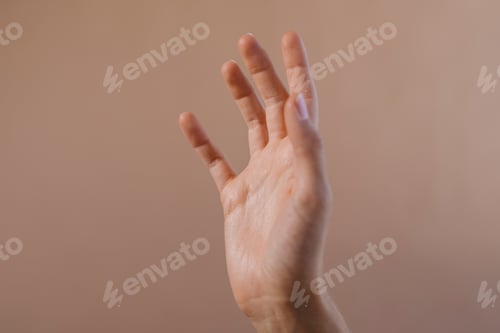 Preview: Hand raising up in the air