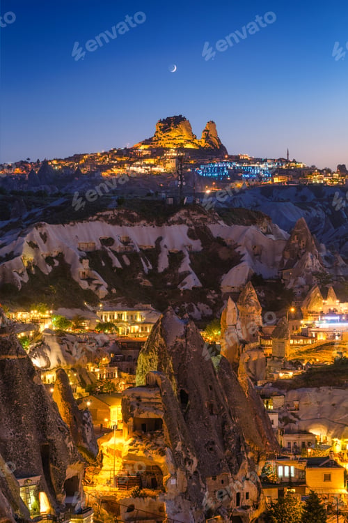 Preview: Goreme, Cappadocia, Turkey. View of the evening city from the mountain. Bright evening city.
