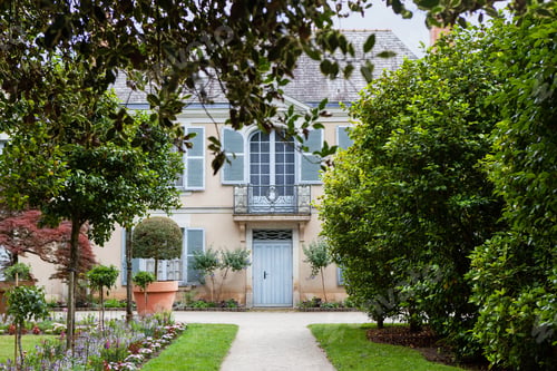 Preview: Facade of a classic architecture and garden in France