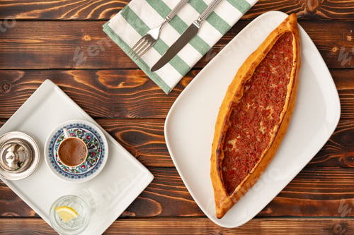 Preview: Pide - Turkish baked bread on wooden table