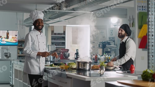 Preview: POV of multiethnic team of chefs recording cooking show video
