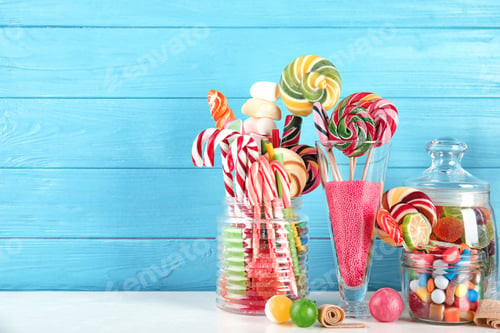 Preview: Composition with many different candies on table. Space for text