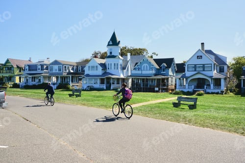 Preview: People riding their bikes in a neighborhood on Martha’s Vineyard.