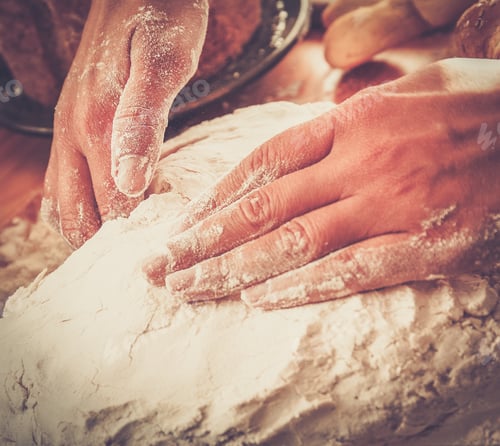 Preview: Cook hands preparing dough for homemade pastry