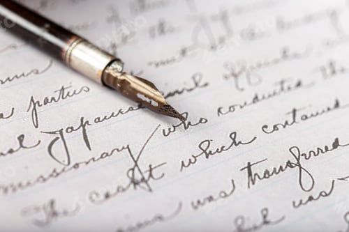 Preview: Fountain pen writes on paper with old style cursive writing in detail