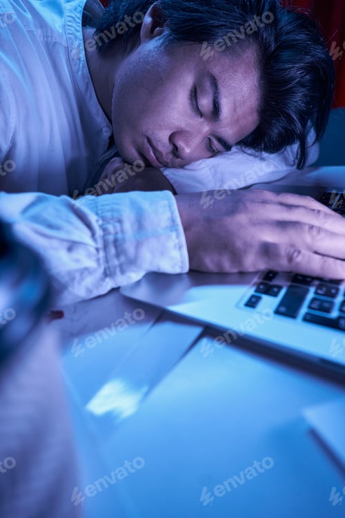 Preview: Worker tired from doing presentation in evening