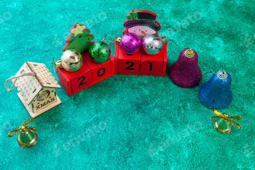 Preview: front view cute xmas toys with writing on green background color holiday new year photo