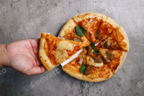 Preview: Hand Taking Pepperoni Pizza Slice
