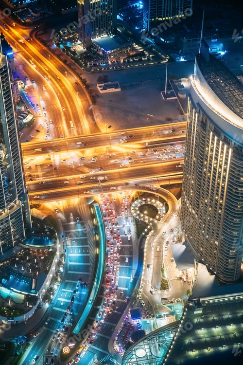 Preview: Aerial View Of Urban Background Of Illuminated Cityscape With Towers In Dubai. Street Night Traffic