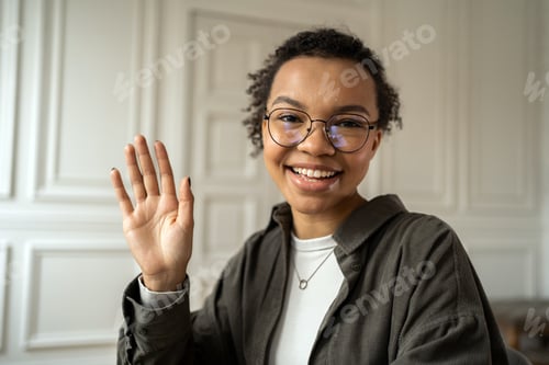 Preview: online video communication woman student online learning remotely on school website uses laptop