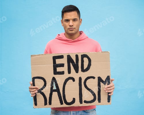 Preview: Portrait, protest and racism with a man in studio on a blue background for freedom at a march or ra