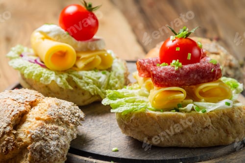 Preview: Sandwich with salami, tomato, cheese and lettuce