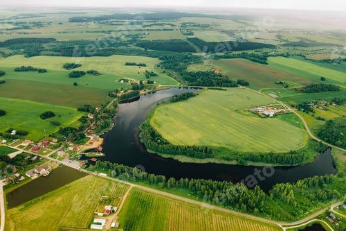 Preview: view from the height of the Lake in a green field in the form of a horseshoe and a village in the