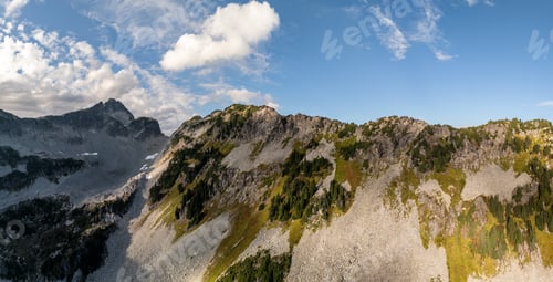 Preview: Majestic Mountain Ridge Under Clear Blue Sky in British Columbia, Canada