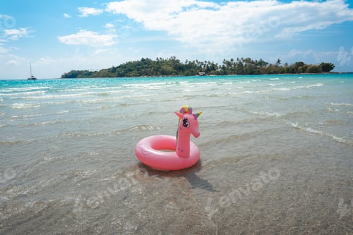 Preview: Pink rubber ring and beach scenery on the island