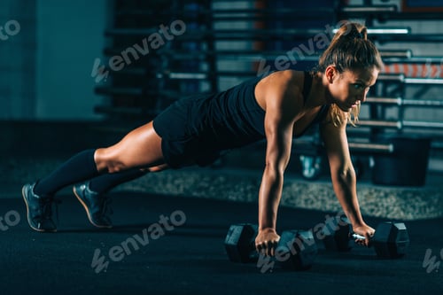 Preview: Cross training. Young woman exercising at the gym