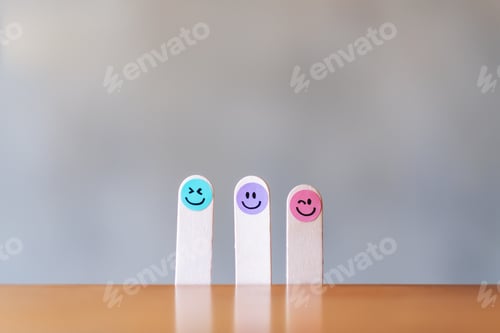 Preview: Colorful hand draw happy emotion faces on wooden stick with background
