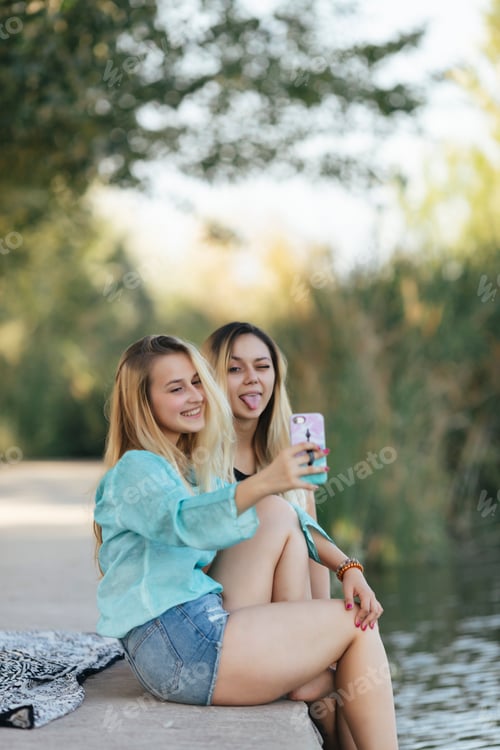 Preview: Two friends at lake