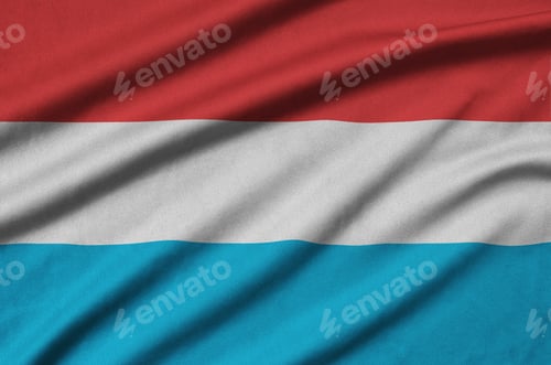 Preview: Luxembourg flag is depicted on a sports cloth fabric with many folds. Sport team waving banner