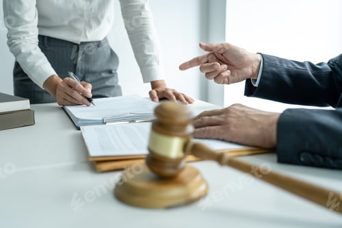 Preview: Businesswoman and Male lawyer or judge consult and conference having team meeting with client