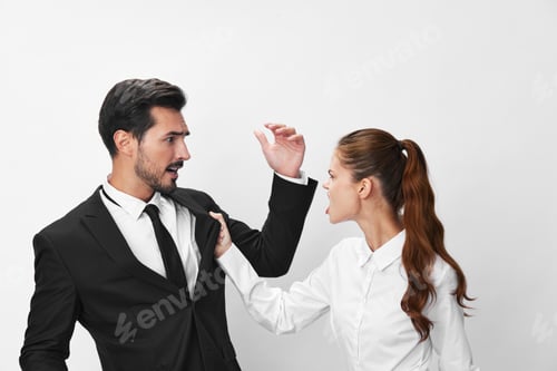 Preview: Man and woman anger business hitting on each other screaming with their hands up in the air on a