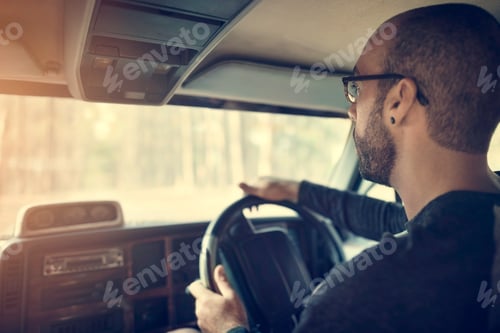 Preview: Man Driving Road Trip Travel Concept