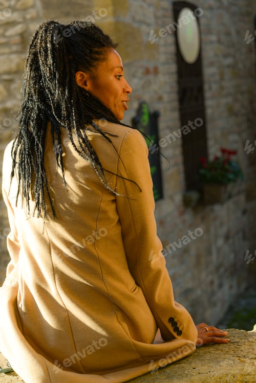 Preview: stylish black young woman model wear winter elegant clothing stands confidently in snowy landscape