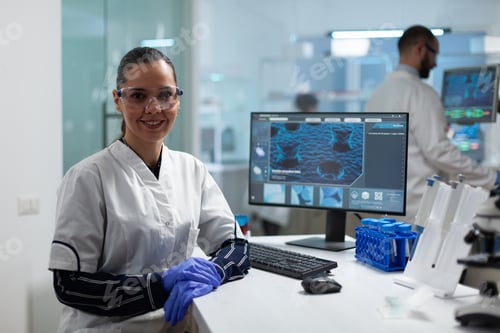 Preview: Portrait ofscientist researcher woman working in microbiology hospital laboratory