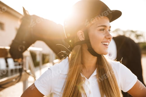 Preview: Beautiful woman wearing hat with horse