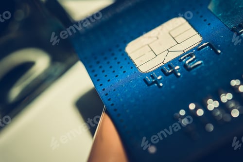 Visualização: Blue Chip Credit Card on a Desk Close Up