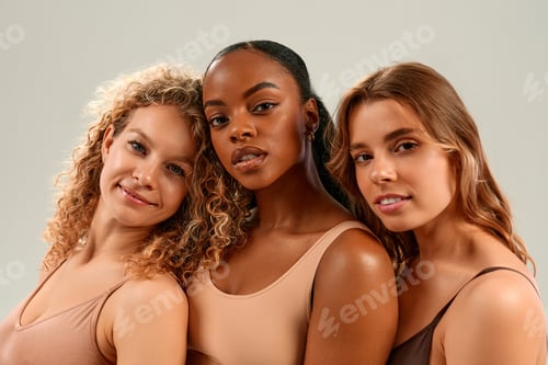 Preview: Three Attractive Women Posing in Tank Tops