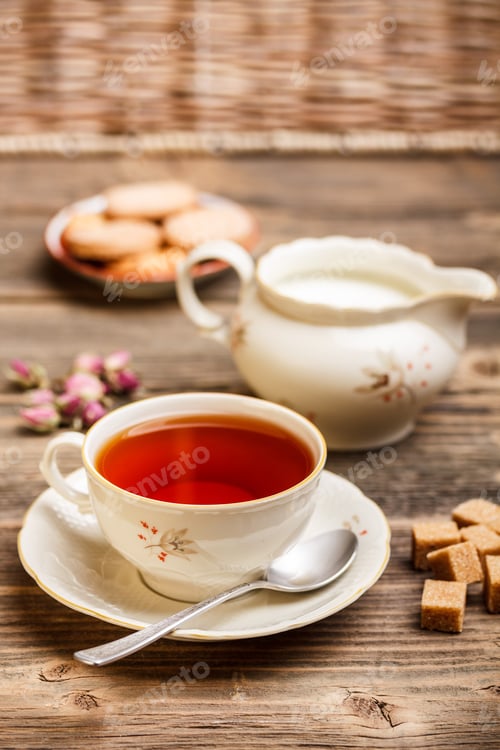 Cup of Tea with Milk and Brown Sugar