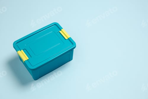 Preview: Closed lunch box. Monochrome stylish composition in blue color. Top view, flat lay