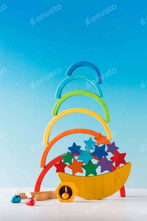 Preview: Wooden educational toys for preschool children on a blue background. Montessori method.