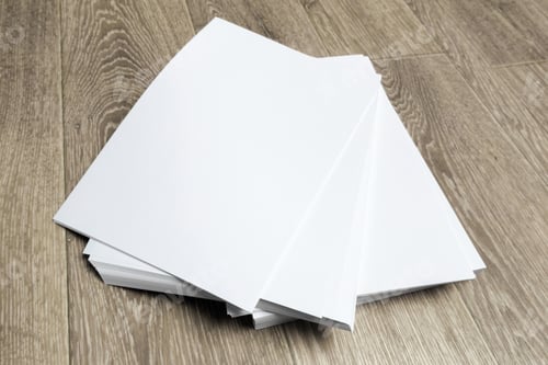Preview: Blank paper on wood table